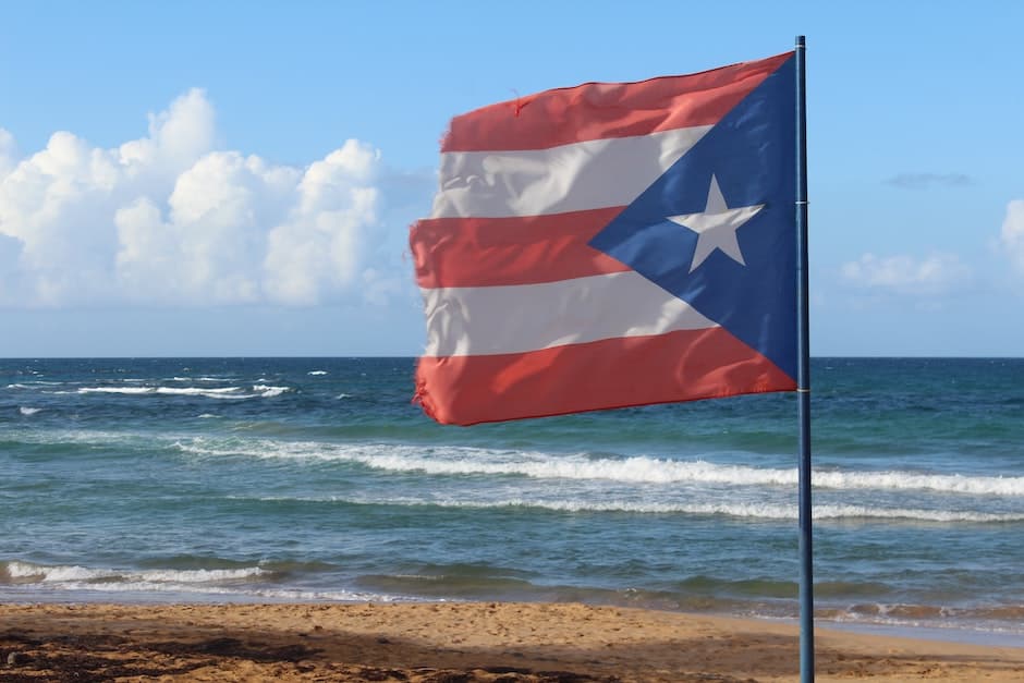 Ripped Puerto Rican Flag on a Flagpole